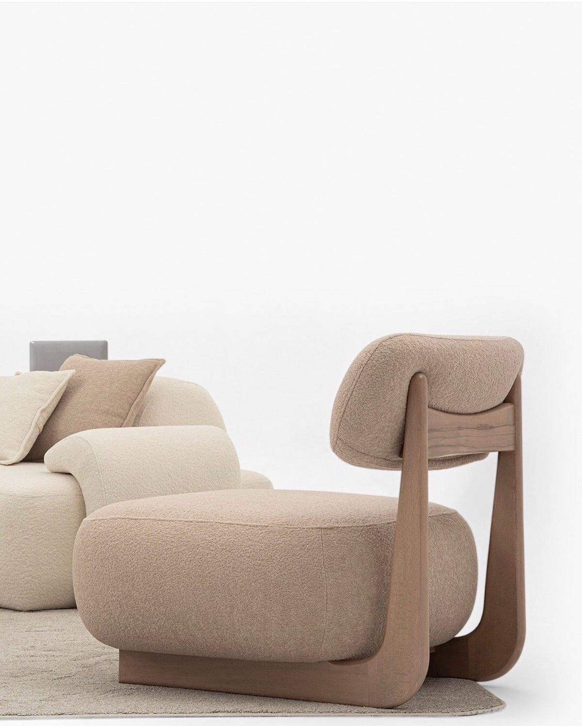 Aureum luxury furniture collection featuring modern neutral living room seating, sculptural dining set, and illuminated contemporary bedroom design.