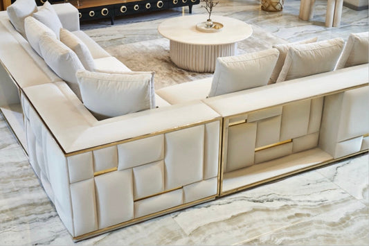 Rhythm luxury furniture collection featuring modular sofa, black dining table, gold detailed sideboard, and geometric modern design.