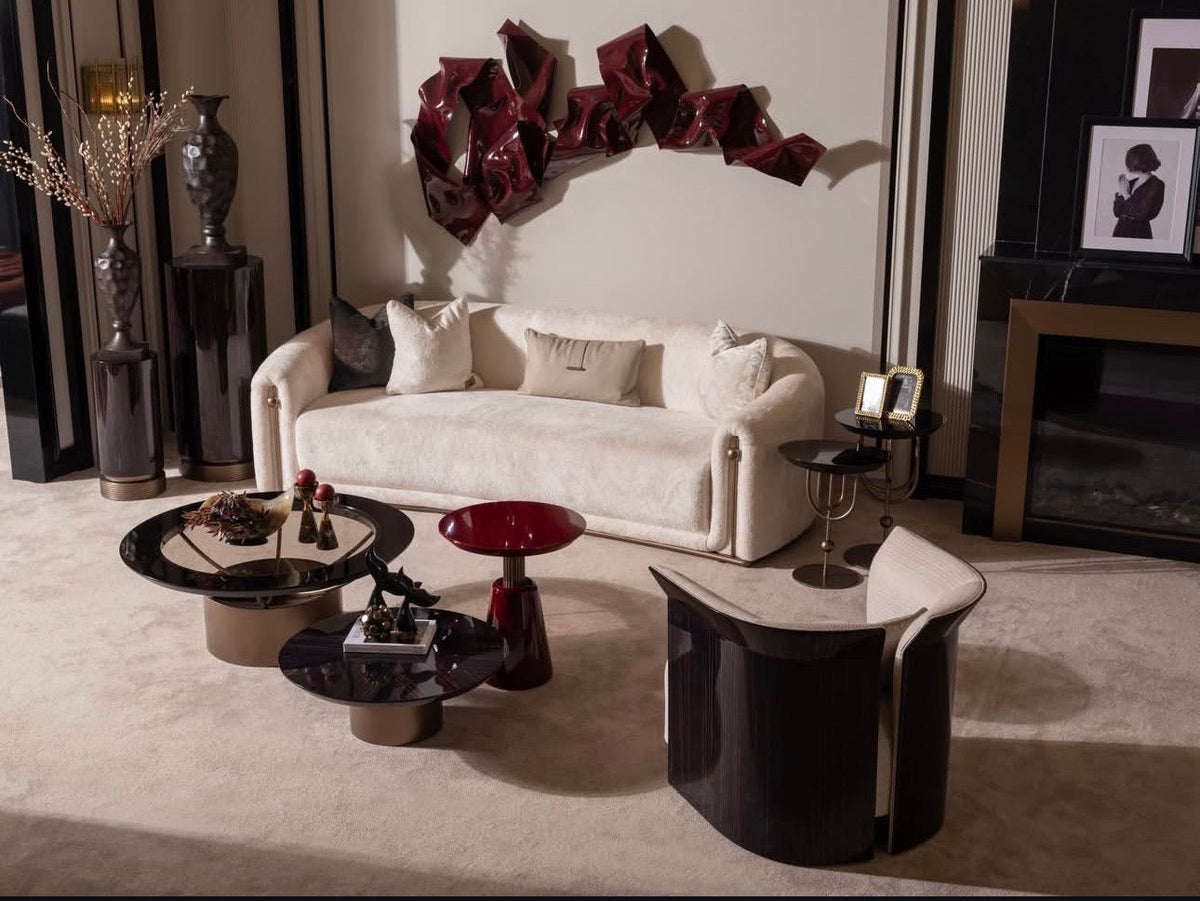 Apex luxury furniture collection with dark wood finishes, neutral seating, modern dining table, and high-end bedroom design.