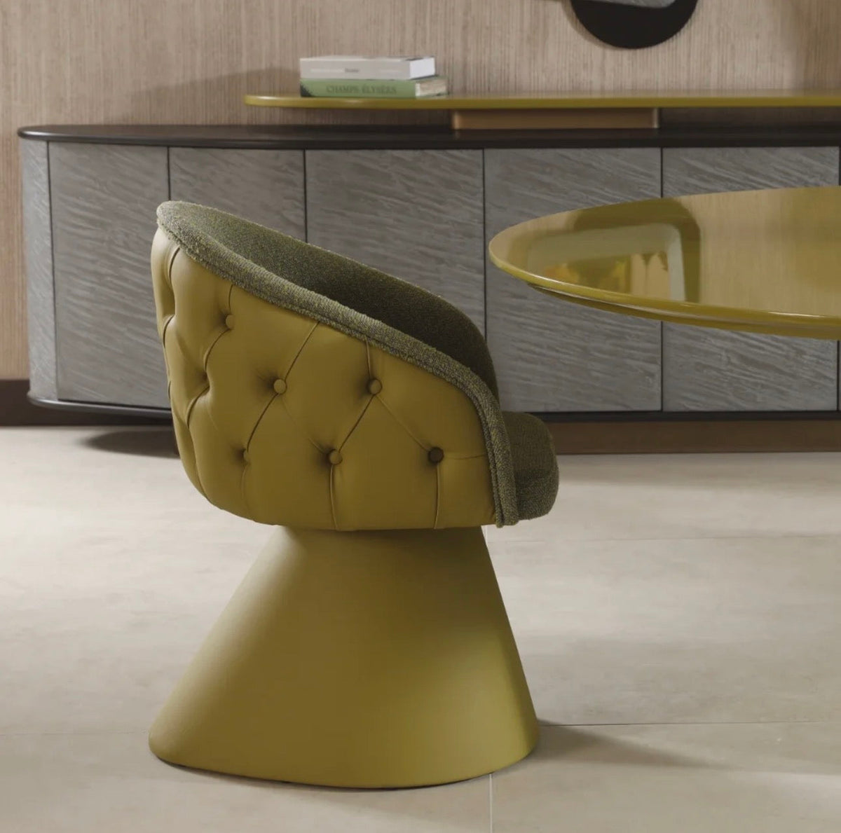 Honey modern luxury dining furniture collection with sculptural green dining table and tufted pedestal dining chairs.
