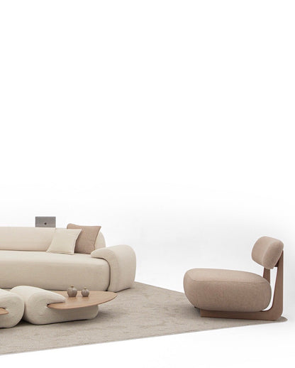 Aureum luxury furniture collection featuring modern neutral living room seating, sculptural dining set, and illuminated contemporary bedroom design.