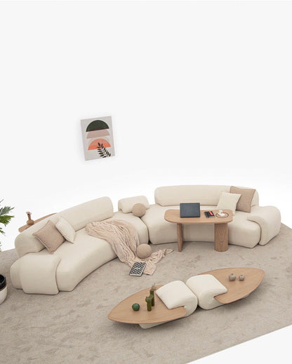 Aureum luxury furniture collection featuring modern neutral living room seating, sculptural dining set, and illuminated contemporary bedroom design.
