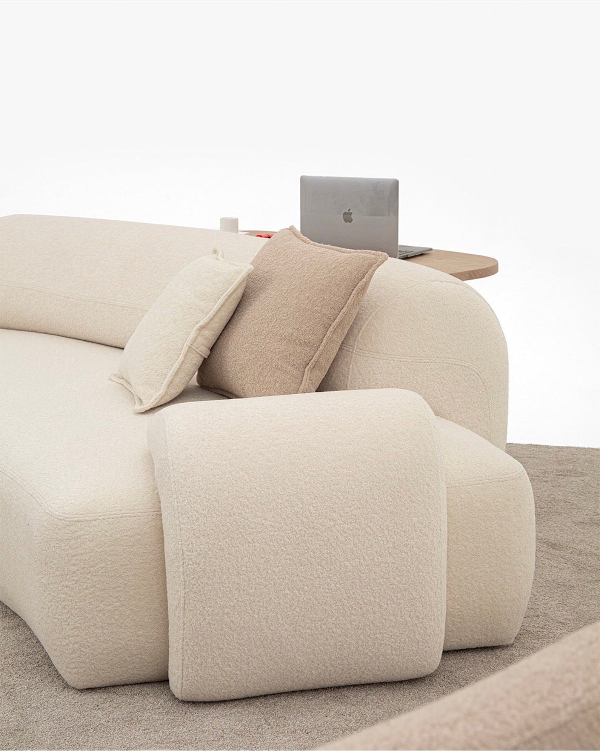 Aureum luxury furniture collection featuring modern neutral living room seating, sculptural dining set, and illuminated contemporary bedroom design.