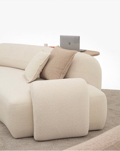 Aureum luxury furniture collection featuring modern neutral living room seating, sculptural dining set, and illuminated contemporary bedroom design.