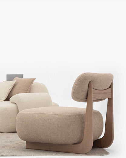Aureum luxury furniture collection featuring modern neutral living room seating, sculptural dining set, and illuminated contemporary bedroom design.