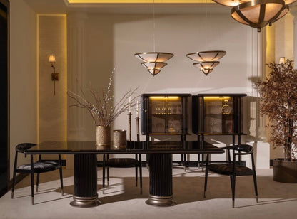 Velvetroom luxury furniture collection featuring elegant sofa seating, modern dining table, illuminated cabinetry, and sculptural pendant lighting.