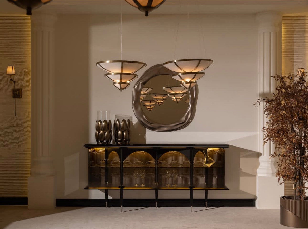 Velvetroom luxury furniture collection featuring elegant sofa seating, modern dining table, illuminated cabinetry, and sculptural pendant lighting.