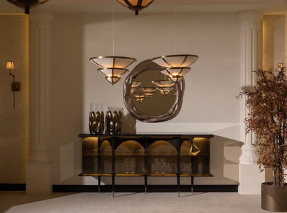 Velvetroom luxury furniture collection featuring elegant sofa seating, modern dining table, illuminated cabinetry, and sculptural pendant lighting.