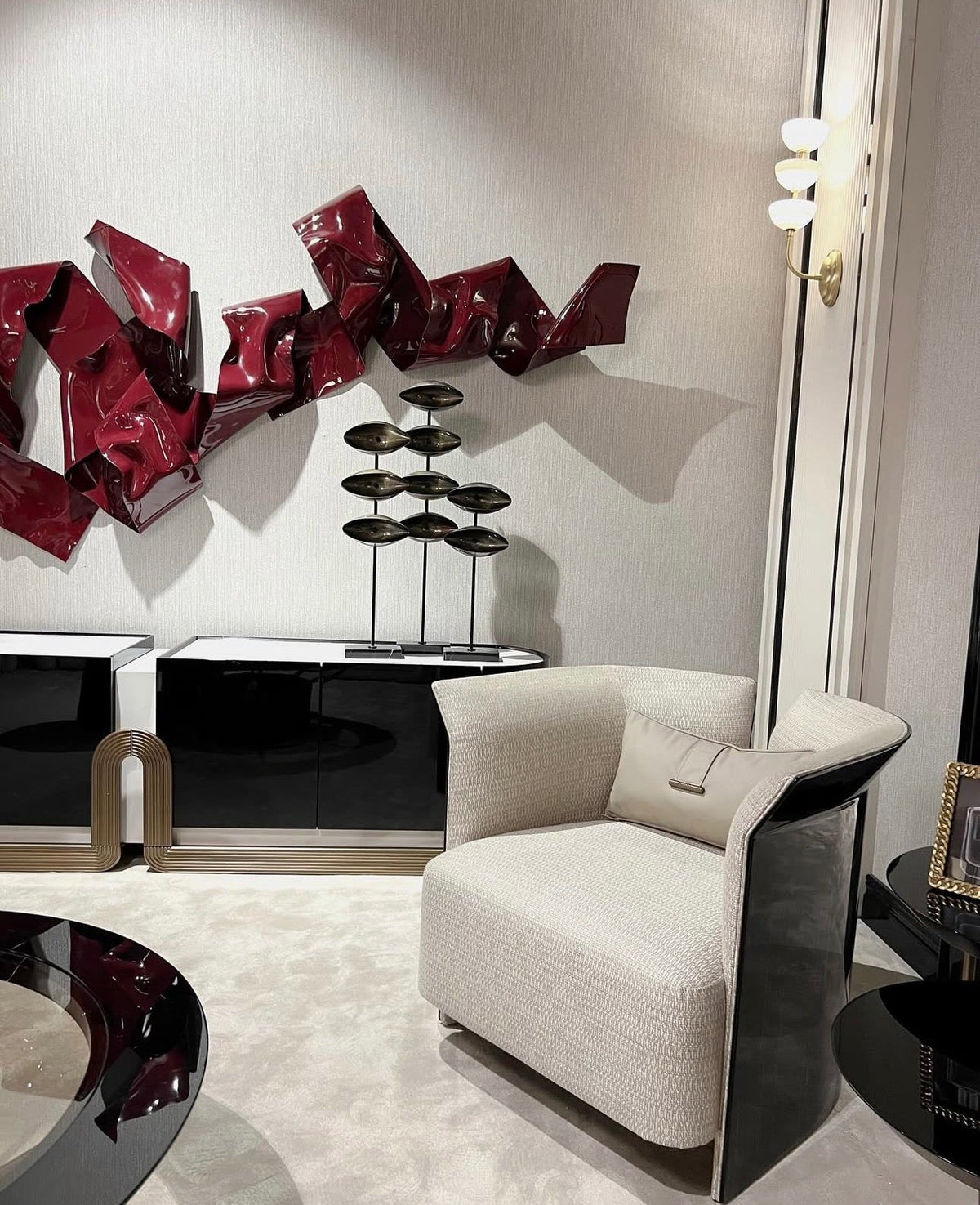 Apex luxury furniture collection with dark wood finishes, neutral seating, modern dining table, and high-end bedroom design.