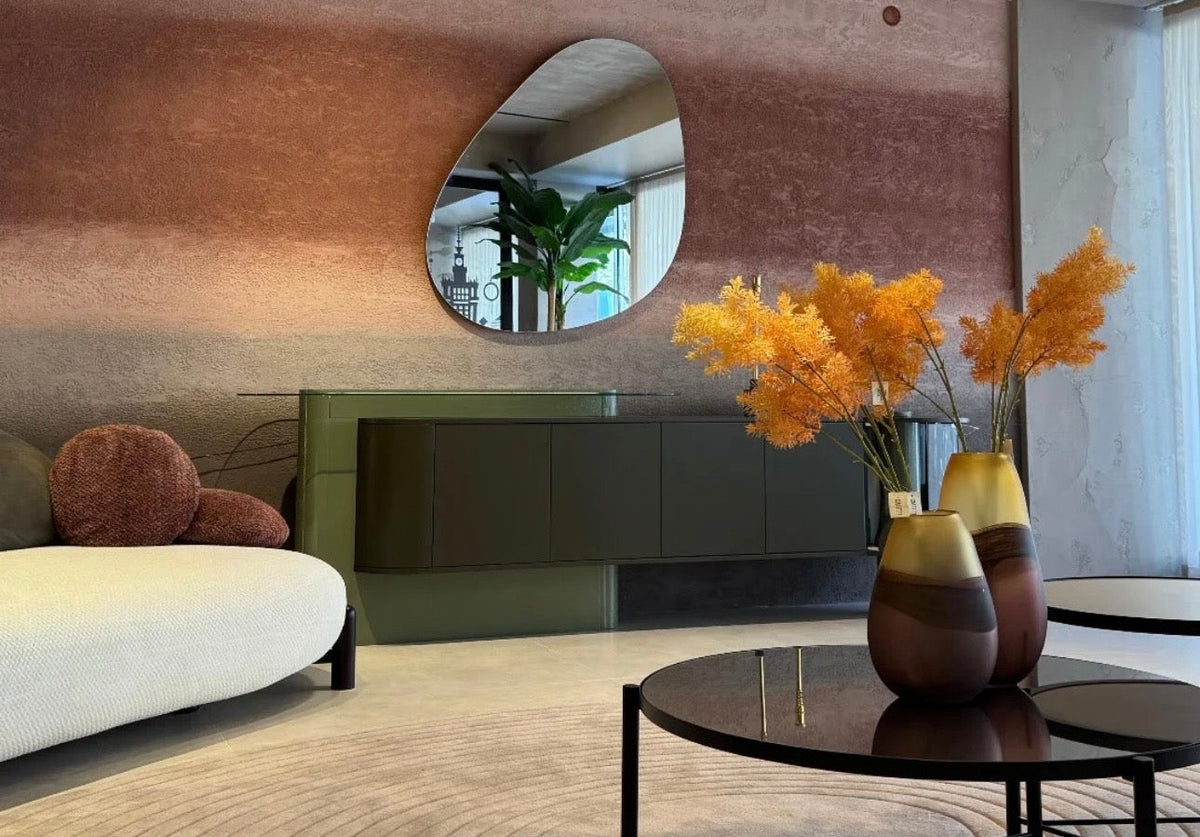 Honey modern luxury dining furniture collection with sculptural green dining table and tufted pedestal dining chairs.