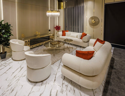 Ivory luxury furniture collection with gold sideboard, marble walls, white seating, and modern high-end living and dining design.